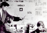 Первая в Карачаево-Черкесии коллективная радиостанция в школе №8. Уч-ся Ю.Волошин, В.Шаповалов ведут связь, а Володя Шмелев ищет на большой карте город Новосибирск. 1962 г.